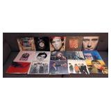 UL - Collection of 14 Classic Rock Vinyl Records Featuring George Harrison, ELO, John Cougar, and More