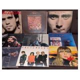 UL - Collection of 14 Classic Rock Vinyl Records Featuring George Harrison, ELO, John Cougar, and More