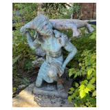 Metal Garden Statue of Kneeling Man Carrying Sack
