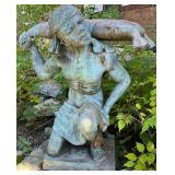 Metal Garden Statue of Kneeling Man Carrying Sack