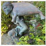 Metal Garden Statue of Kneeling Man Carrying Sack