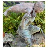Metal Garden Statue of Kneeling Man Carrying Sack