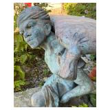 Metal Garden Statue of Kneeling Man Carrying Sack