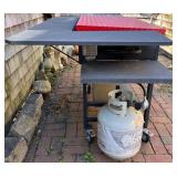 Blackstone 4-Burner Outdoor Gas Griddle with Red Steel Cover and Side Shelves