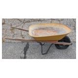 G - Used Wheelbarrow with Paint Wear and Flat Tire