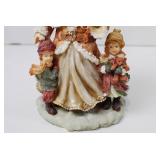 Santa Claus Figurine with Children and Toys