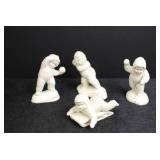 Set of 4 Antique Bisque Snow Baby Figurines