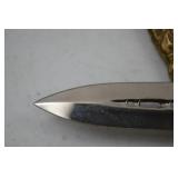 Decorative Dagger With Ornate Sheath and Lion Head Pommel