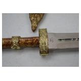 Decorative Dagger With Ornate Sheath and Lion Head Pommel