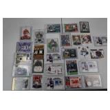 Football Jersey & Memorabilia Card Lot - Relics, Rookies & Inserts
