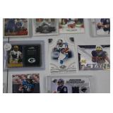 Football Jersey & Memorabilia Card Lot - Relics, Rookies & Inserts