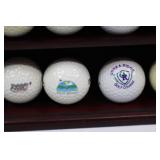 Golf Ball Display Case with Clock and Assorted Logo Golf Balls