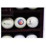 Golf Ball Display Case with Clock and Assorted Logo Golf Balls