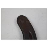 Decorative horseshoe with musical notes and TPJ initials