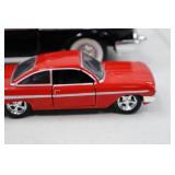 Jada 1:32 Red Diecast Car and Black Chevy Bel Air Convertible Model Lot