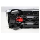 Jada 1:32 Red Diecast Car and Black Chevy Bel Air Convertible Model Lot