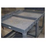 Heavy-duty plastic utility cart with two shelves and compartments