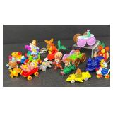 Collection of Assorted Toy Figurines and Vehicles