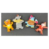 Collection of Assorted Toy Figurines and Vehicles