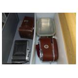 Cabinet of Drawers with Contents - Light Bulbs, MREs, Antique Cameras and Lenses