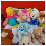 Lot of Plush Toys Including a Colorful Toucans, Bears, and a Red Devil Doll