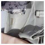 Vareity of Tote Bags Including Floral Print, Red Tote, and Zebra Pattern Bag