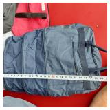 Adidas Black Duffel, Grey Gym Bag, Blue Carry-On, and Red Tote Bag.