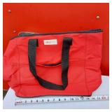 Adidas Black Duffel, Grey Gym Bag, Blue Carry-On, and Red Tote Bag.