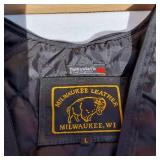 Leather Motorcycle Apparel including Interstate Leather Vest Size L and Interstate Leather Chaps Size Small. And Milwaukee Vest Liner SizeL