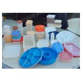 Lot of Plastic Food Storage Containers including Various Sizes and Types, Some with Lids