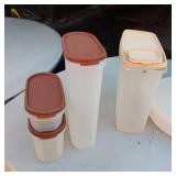 Lot of Plastic Food Storage Containers including Various Sizes and Types, Some with Lids