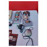 Super Nintendo with Controllers and Games Including Donkey Kong Country, Super Mario World and More