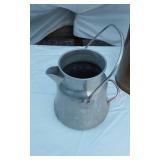 Older Garbage Bin and Wear-Ever Aluminum Pot