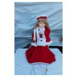 Doll Dressed as Santa Clause with Lighted Candle