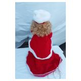 Doll Dressed as Santa Clause with Lighted Candle