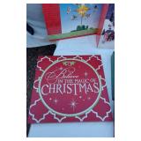 Christmas Decorative Items including Nesting Boxes, Angel Tree Top and Small Lighted Country Village