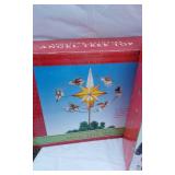Christmas Decorative Items including Nesting Boxes, Angel Tree Top and Small Lighted Country Village