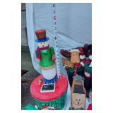 Assorted Christmas Decorations including Plush Moose Toys, Snowman, Big Mouse, Ribbons, and Baskets