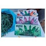 Holiday Lighting and Decorations Lot including Bubble Lights, 100 Green Mini Lights, 100 Purple Mini Lights, and Assorted String Lights