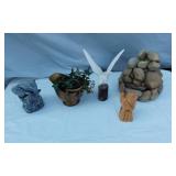 Lot of Decorative Items Including Gold Vase with Ivy, White Bird Sculpture, Stone Fountain, and Wood Carving