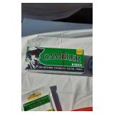 Assorted household and miscellaneous items including fabrics, salsa mix, weights, tobacco tubes, and small tools