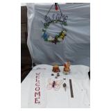 Welcome Sign with Butterfly Design, Santa Figurine, and Assorted Decorative Items