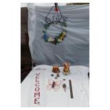 Welcome Sign with Butterfly Design, Santa Figurine, and Assorted Decorative Items