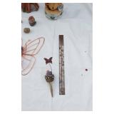 Welcome Sign with Butterfly Design, Santa Figurine, and Assorted Decorative Items