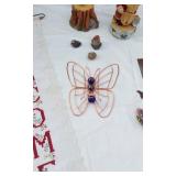 Welcome Sign with Butterfly Design, Santa Figurine, and Assorted Decorative Items