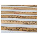 Lot of Wooden Yardsticks Including Petersen Service Center, Menards, and Craftmasters