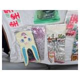 Holiday and Party Supplies including Gift Bags, Hangers, and Decorations