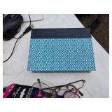 Assorted Household and Craft Items including Reading Glasses, Fabric Roll, Coffee Can, Storage Bags, and More