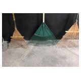 Large Assortment of Lawn and Garden Tools Including Rakes, Shovels, Hoes, and Brooms