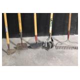 Large Assortment of Lawn and Garden Tools Including Rakes, Shovels, Hoes, and Brooms